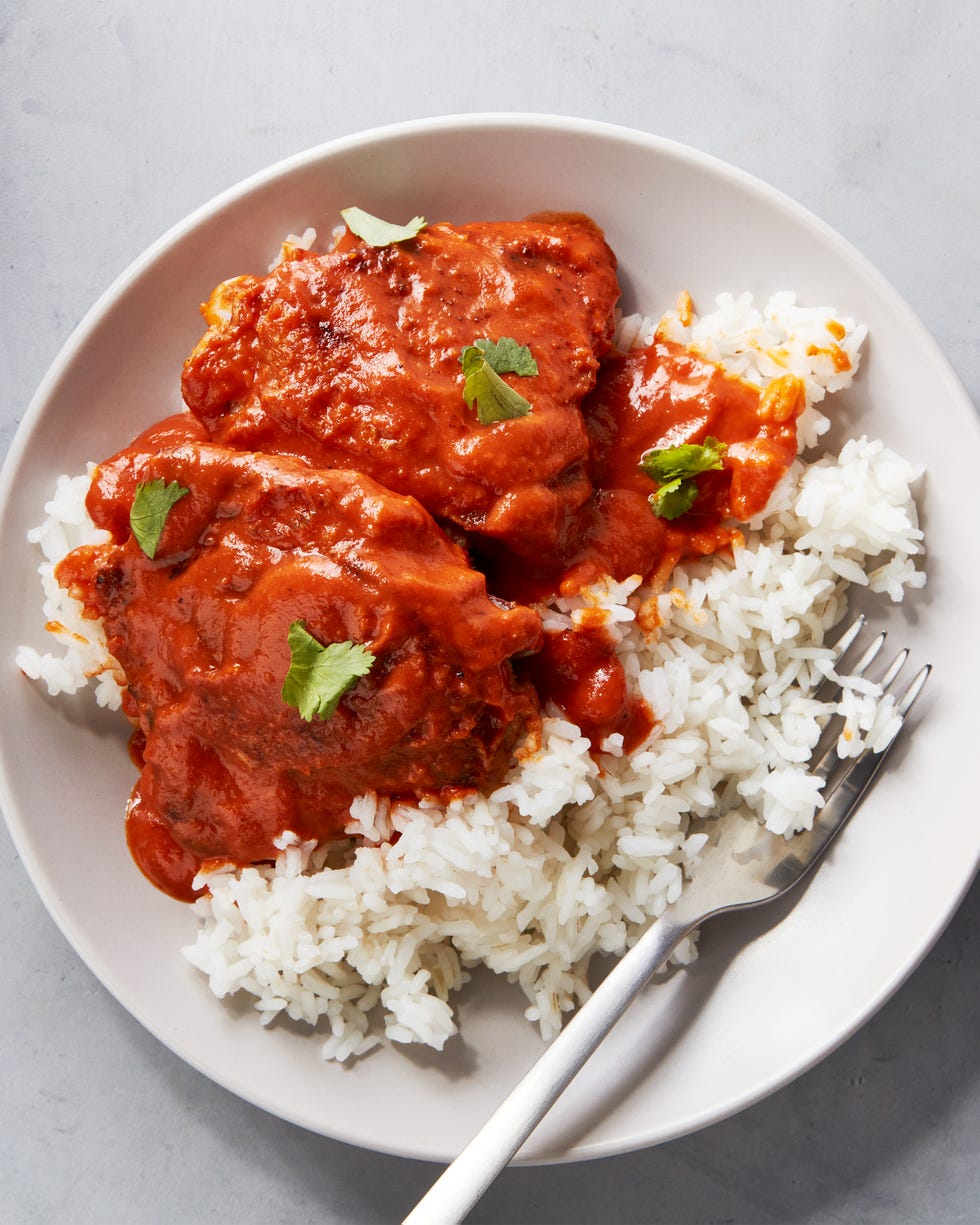 garam masala seasoned and seared chicken thighs smothered in spicy, creamy red curry sauce