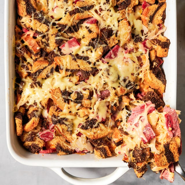 a cross between a reuben sandwich and stuffing, this 8 ingredient, one pan dinner features layers of corned beef, swiss cheese, sauerkraut, russian dressing, and pumpernickel rye swirled marble croutons