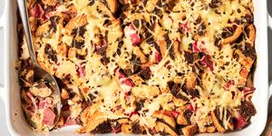 a cross between a reuben sandwich and stuffing, this 8 ingredient, one pan dinner features layers of corned beef, swiss cheese, sauerkraut, russian dressing, and pumpernickel rye swirled marble croutons