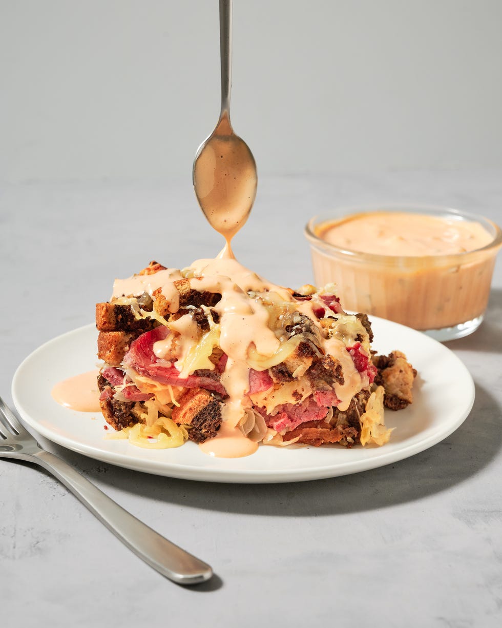 a cross between a reuben sandwich and stuffing, this eight ingredient, one pan dinner features layers of corned beef, swiss cheese, sauerkraut, russian dressing, and pumpernickel rye swirled marble croutons