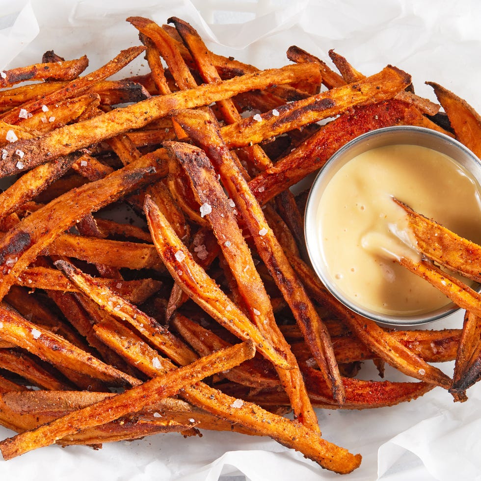 crispy, baked sweet potato fries seasoned with freshly ground black pepper, garlic powder, onion powder, and paprika