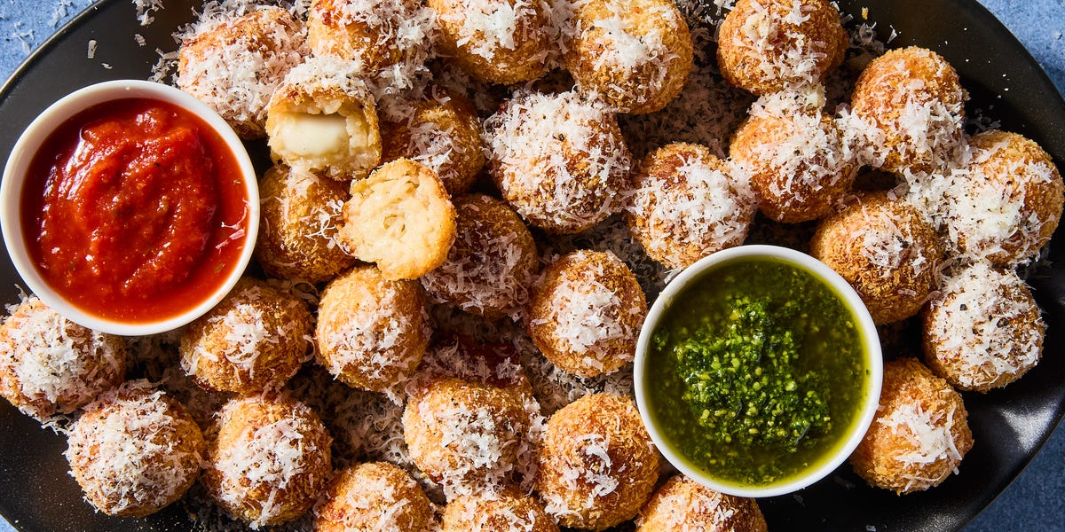 Air Fryer Cacio E Pepe Arancini crispy air fried risotto stuffed with melty mozzarella cheese and topped with pecorino romano and black pepper
