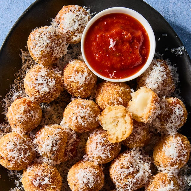 Air Fryer Cacio E Pepe Arancini crispy air fried risotto stuffed with melty mozzarella cheese and topped with pecorino romano and black pepper