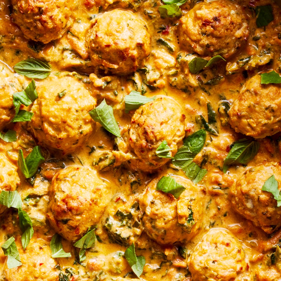 ginger, garlic, and scallion meatballs and a spicy red curry coconut sauce