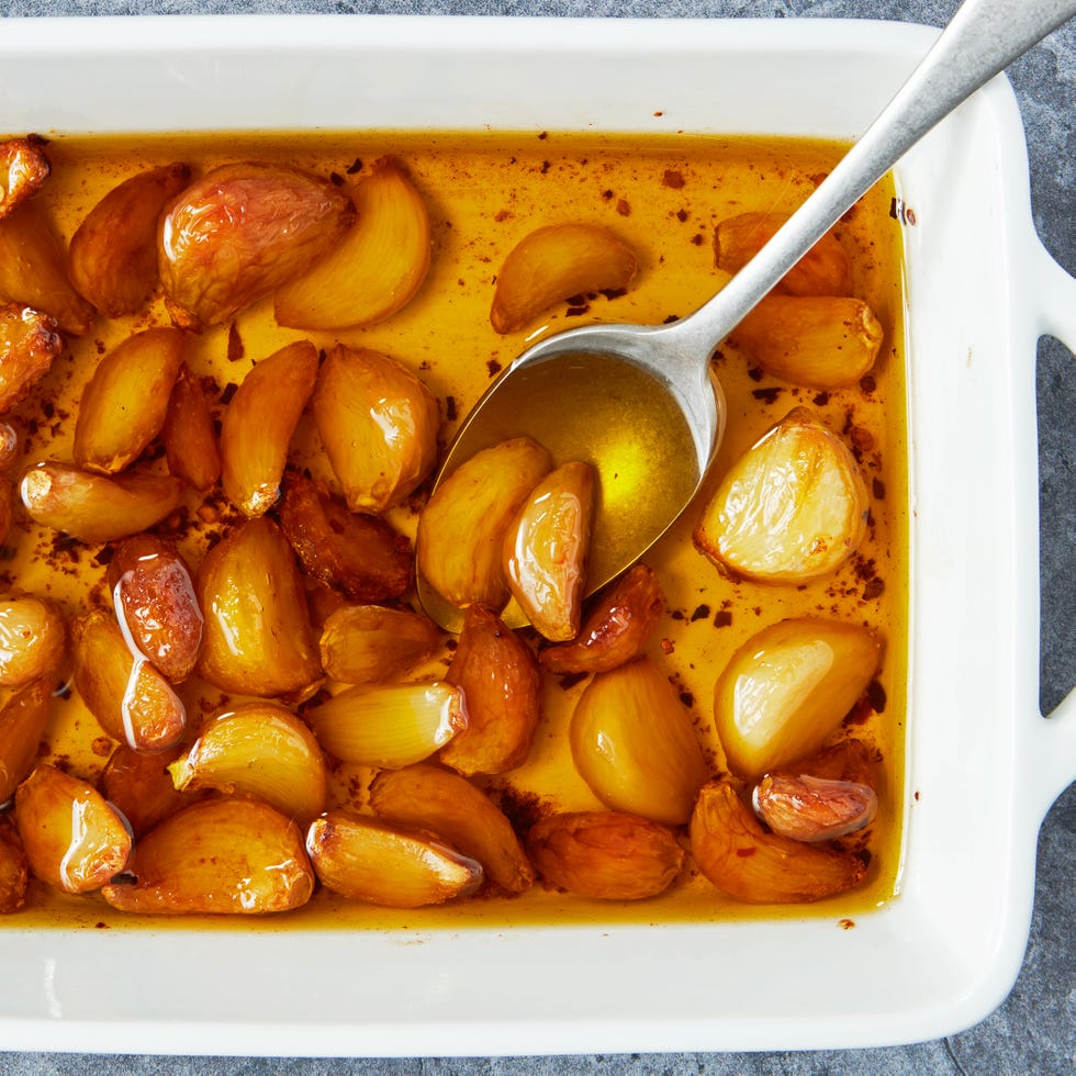 fresh garlic slow roasted in olive oil and crushed red pepper until soft, spreadable, and slightly sweet