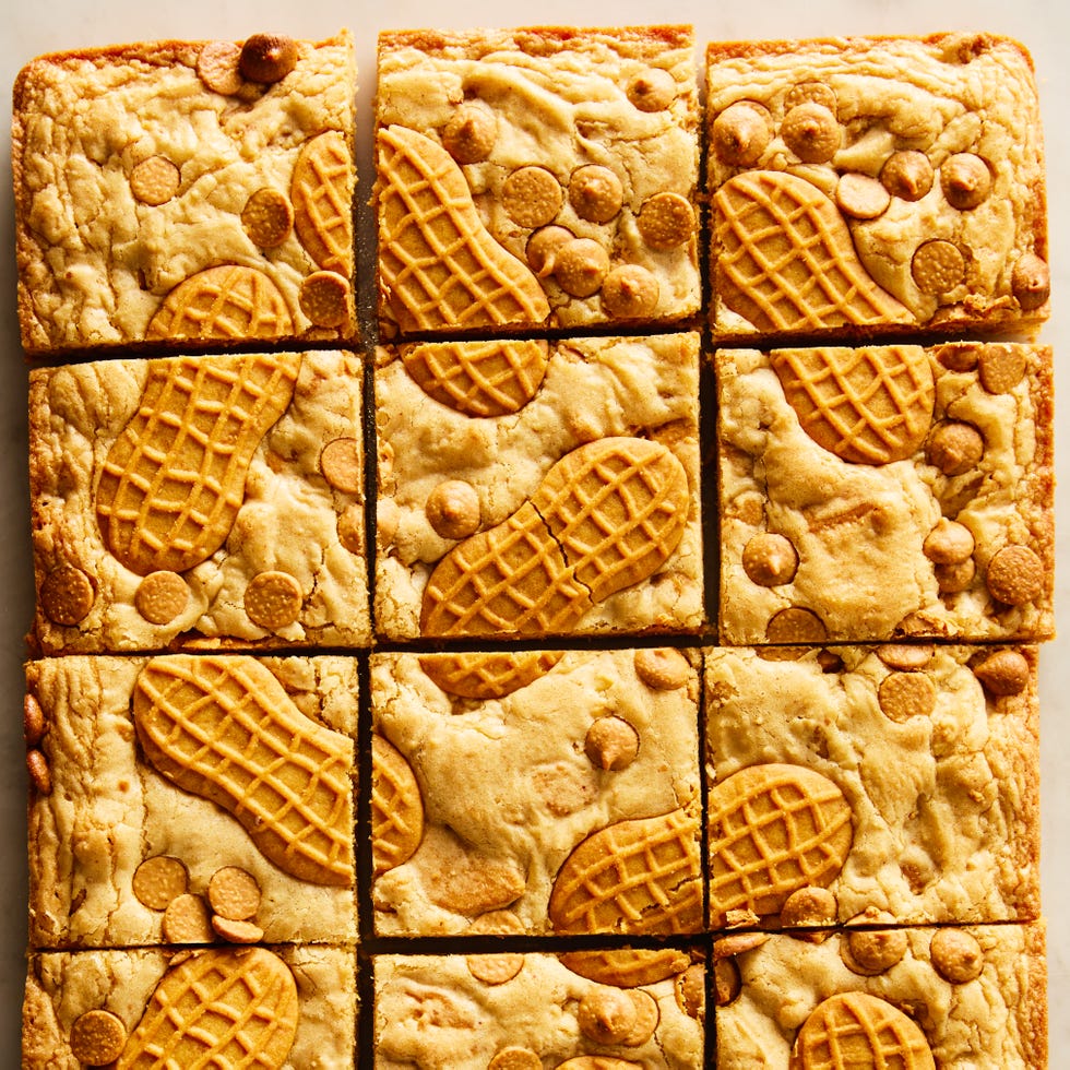 nutter butter cookie bars topped with nutter butters and peanut butter chips