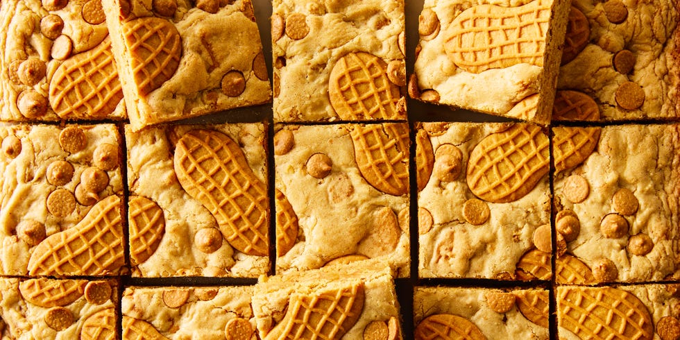nutter butter cookie bars topped with nutter butter cookies and peanut butter chips