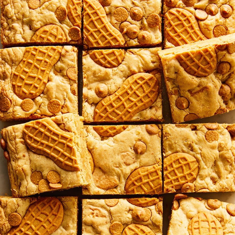 nutter butter cookie bars topped with nutter butter cookies and peanut butter chips