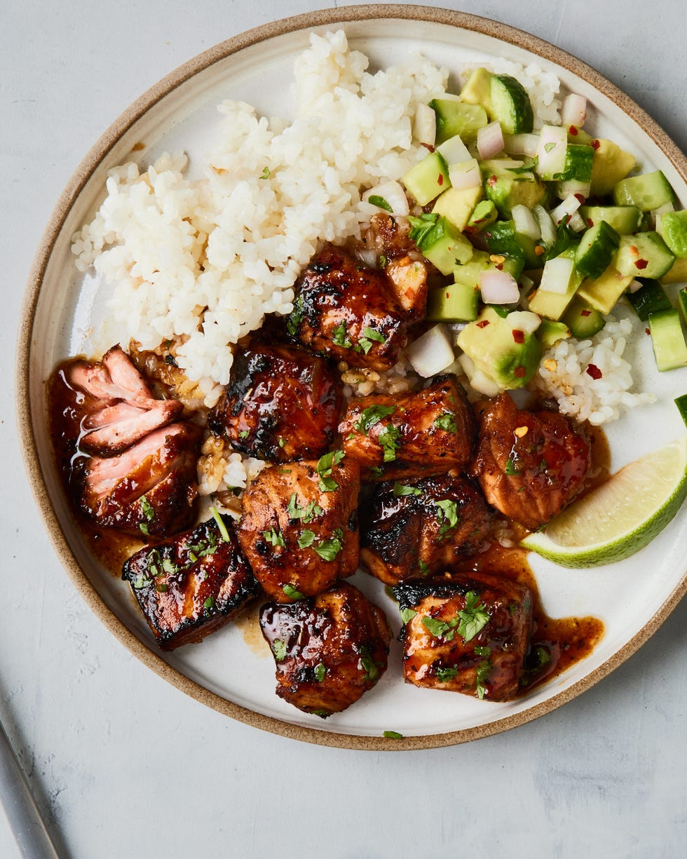 cajun and soy marinated salmon, seared and tossed in honey lime glaze, then served with a cooling cucumber avocado salad and steamed fluffy rice