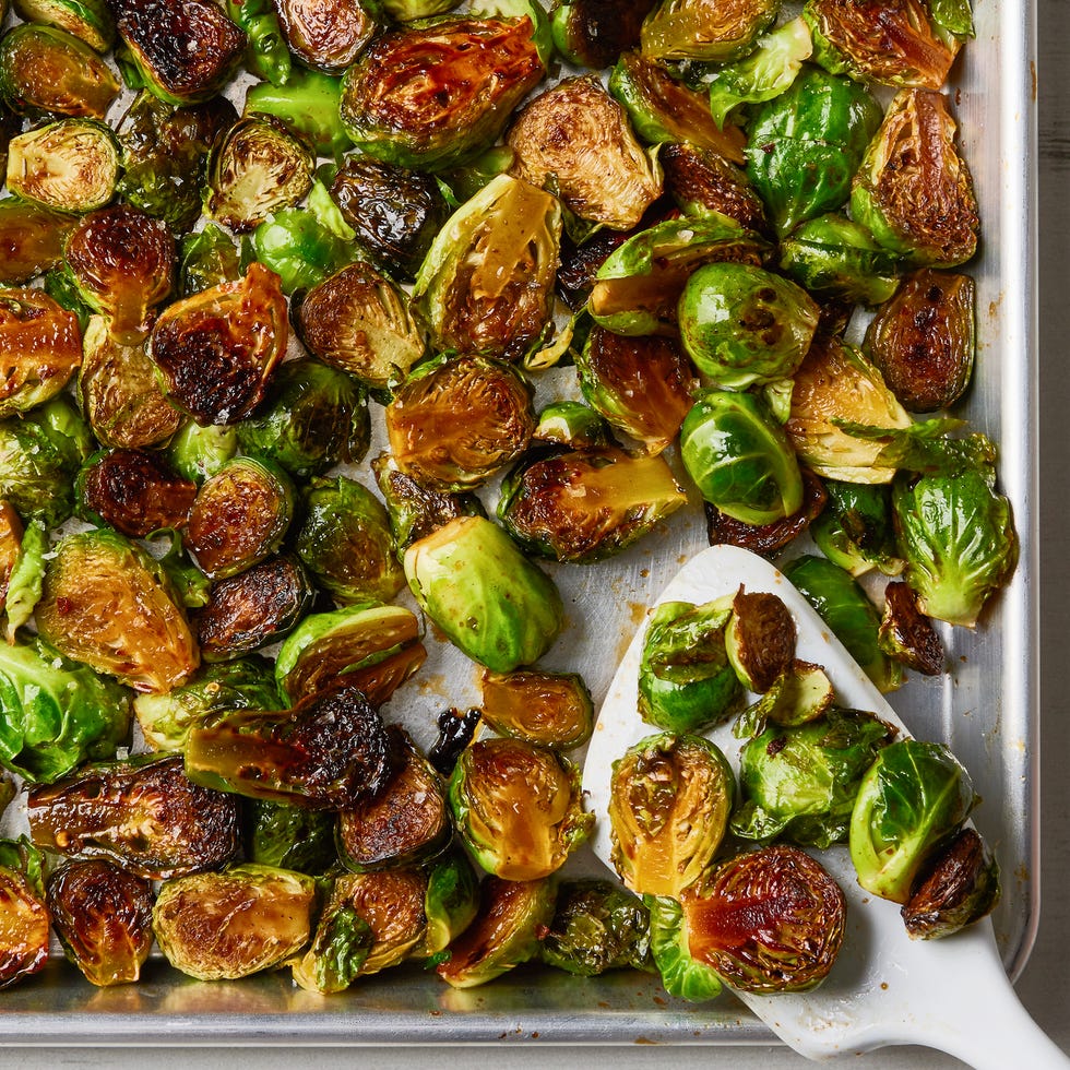 caramelized brussels sprouts on a silver sheet tray