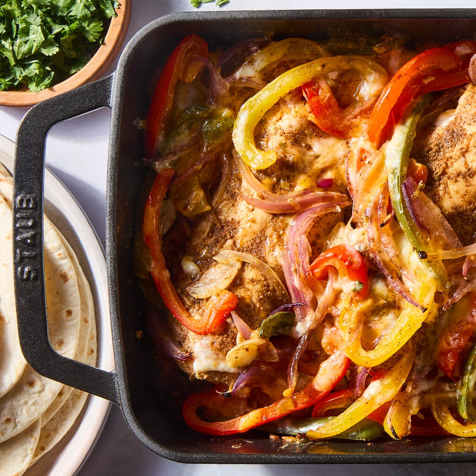 chipotle chile and cumin seasoned chicken breast is nestled into fire roasted tomato rice topped with strips of jalapeno, bell pepper, and sweet red onion then smothered with a three cheese blend and baked