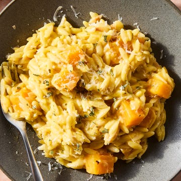 Creamy butternut squash orzo creamy butternut squash orzo on a plate topped with cheese and herbs