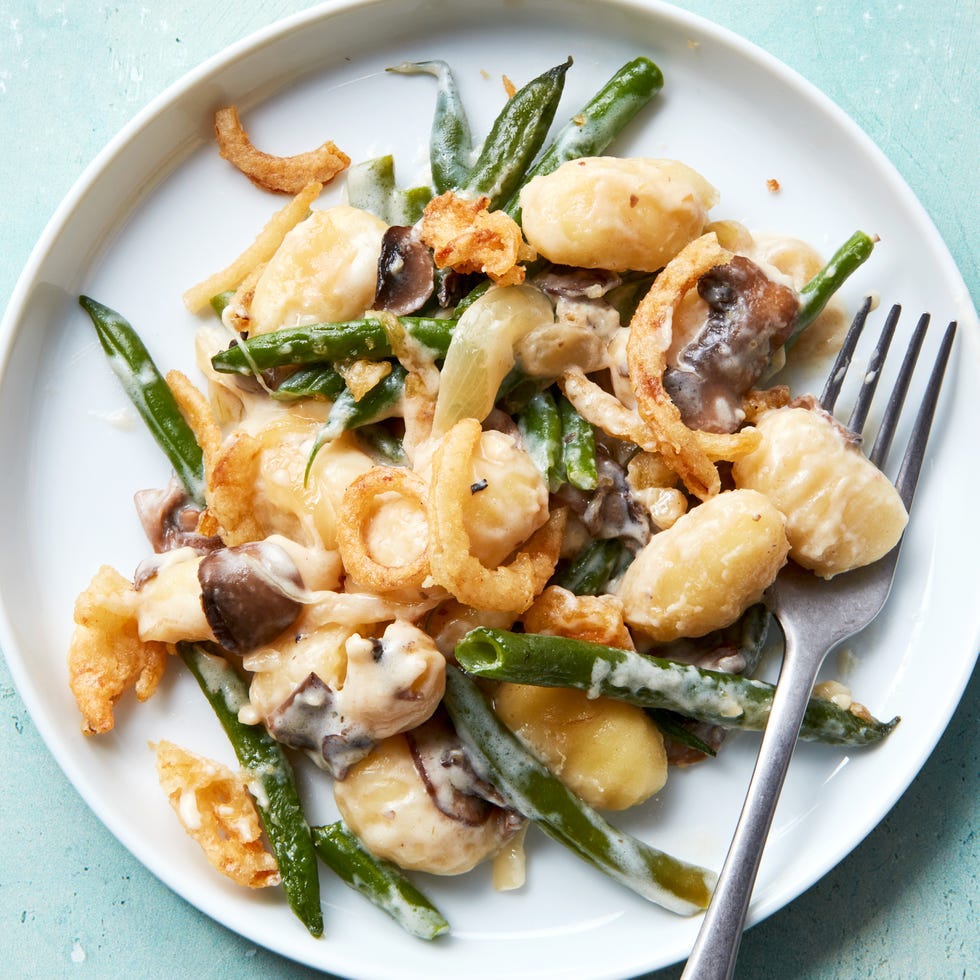 blanched fresh green beans and buttery sliced mushrooms, onions, and garlic get tossed with a creamy bechamel sauce and pillowy gnocchi then baked until bubbly