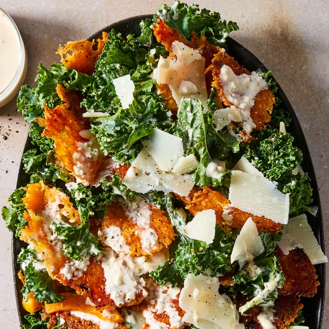 harvest caesar salad with squash croutons and parmesan cheese