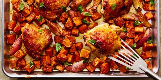 bone in chicken thighs, sweet potatoes, and shallots get smothered with miso chili sauce and baked until the sweet potatoes are tender and caramelized and the chicken is juicy and golden brown
