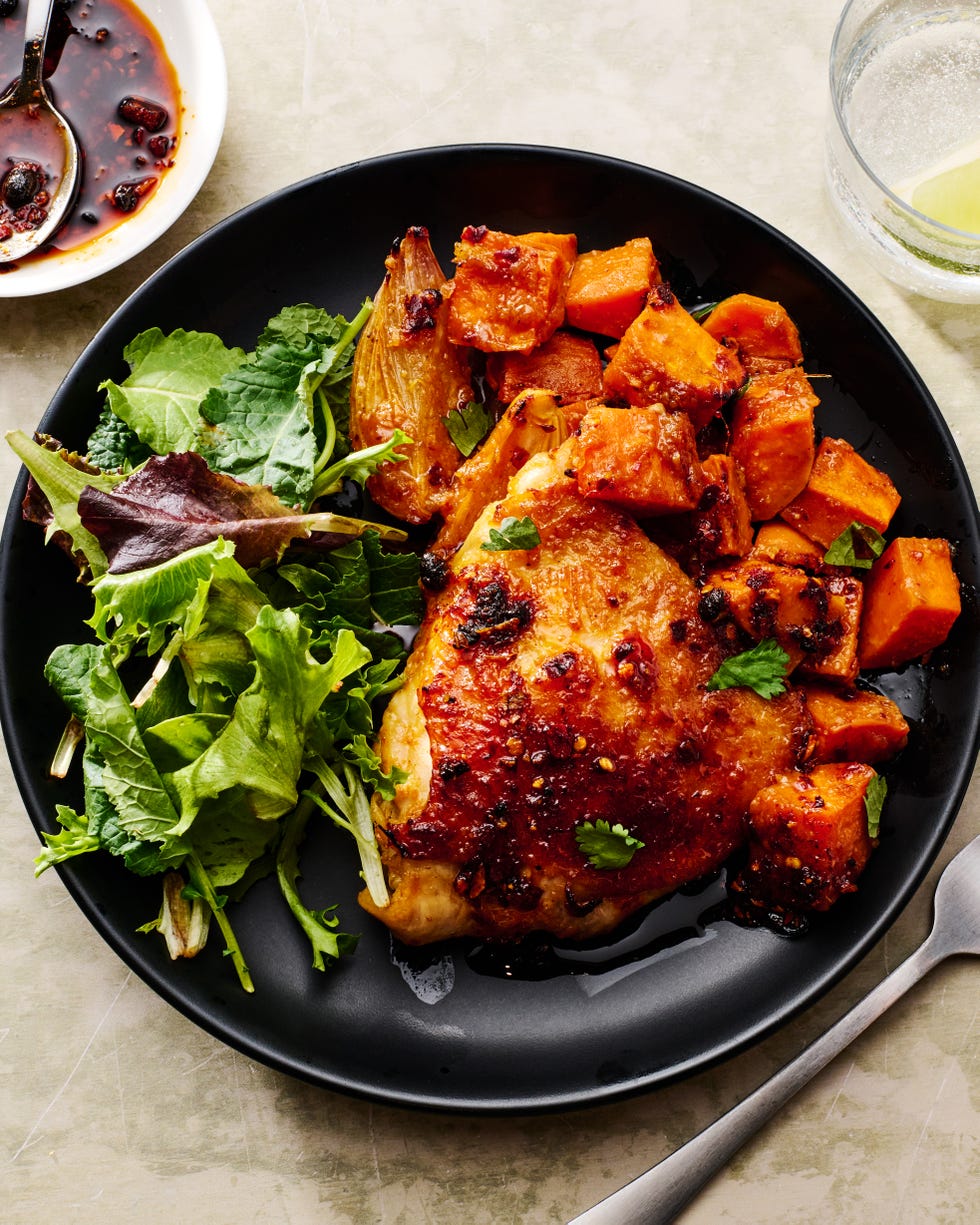 bone in chicken thighs, sweet potatoes, and shallots get smothered with miso chili sauce and baked until the sweet potatoes are tender and caramelized and the chicken is juicy and golden brown