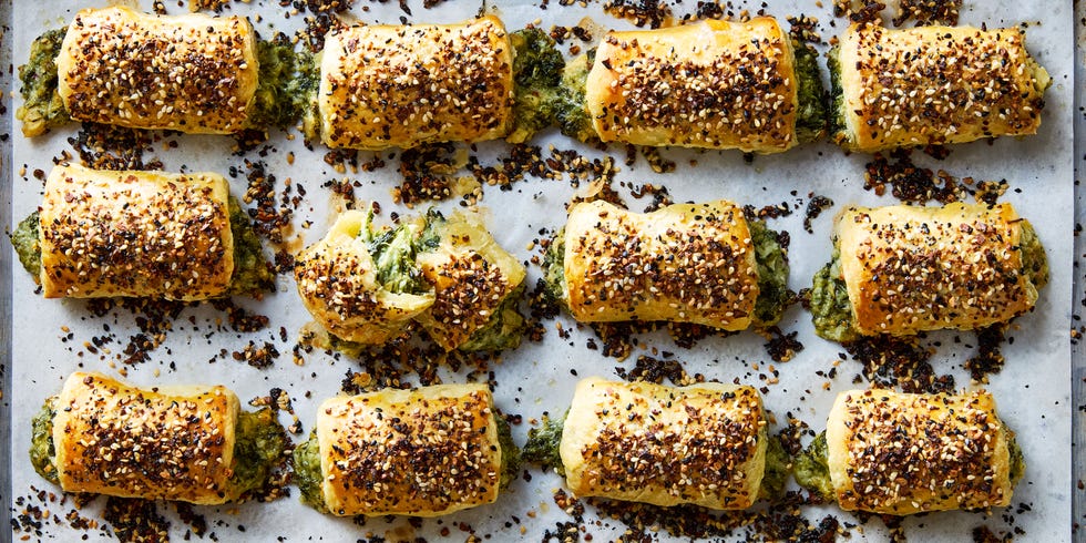 chopped spinach, marinated artichokes, and three types of cheese rolled into flaky puff pastry, topped with everything bagel seasoning, and baked until golden brown