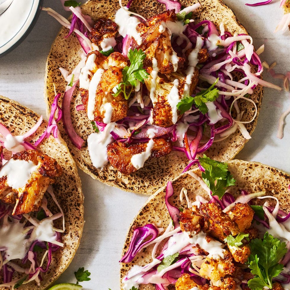 cauliflower tacos with shredded red cabbage on top