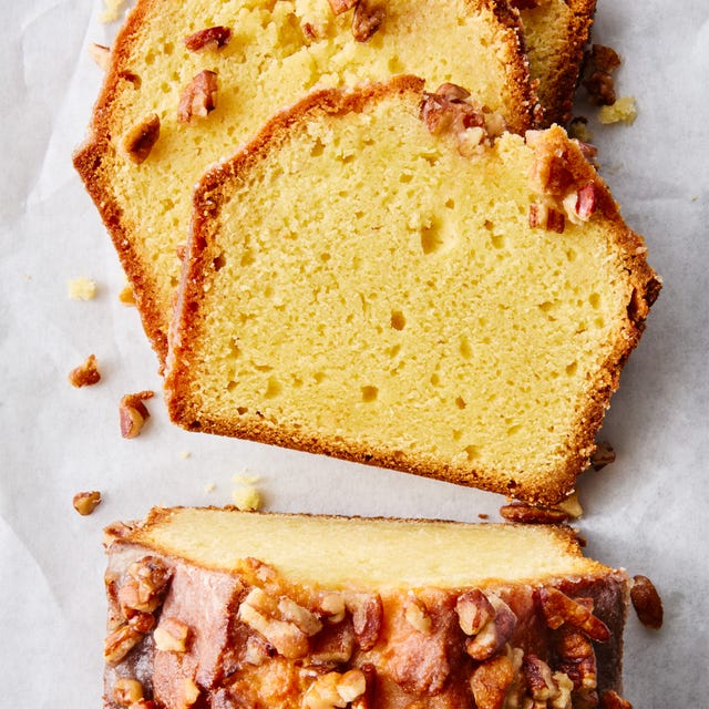 Rum Pound Cake a loaf of pound cake topped with a rum infused glaze and chopped walnuts