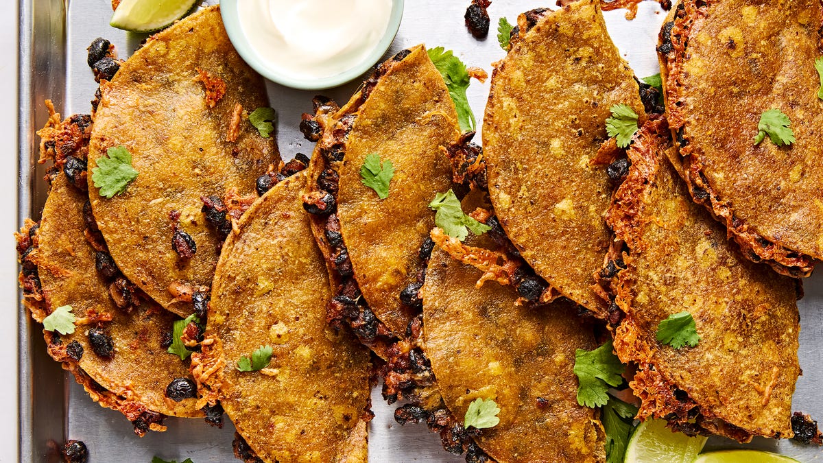 Video player poster image preview for Crispy Sheet-Pan Black Bean Tacos Will Be Your New Favorite Tex-Mex Dinner
