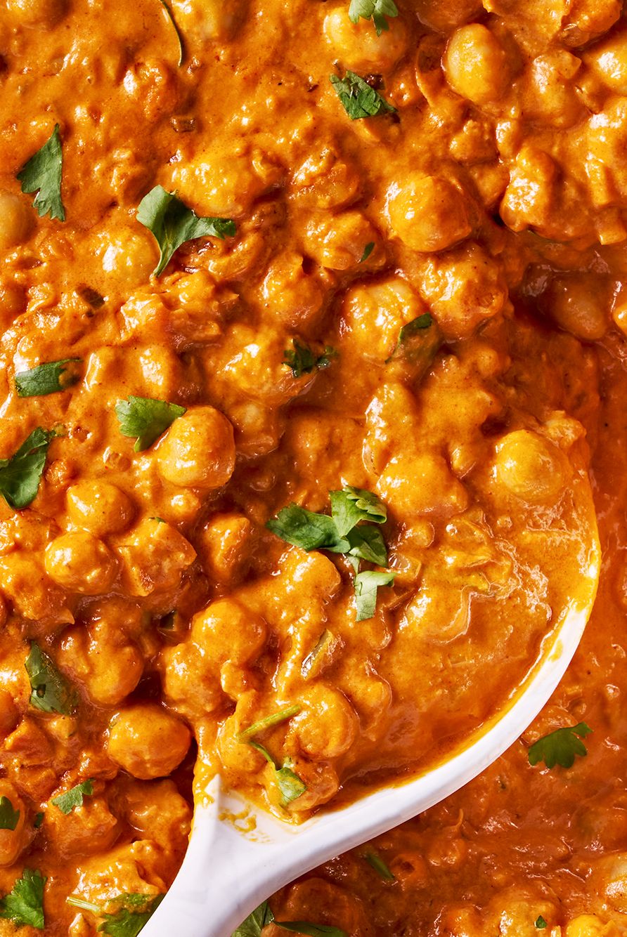 indian butter chickpeas with a spoon