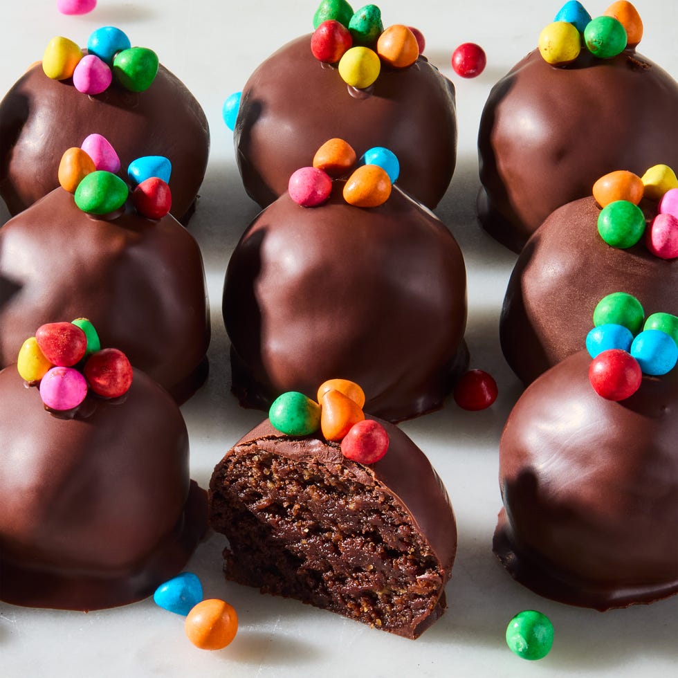 cosmic brownie protein bites sitting in rows on a counter