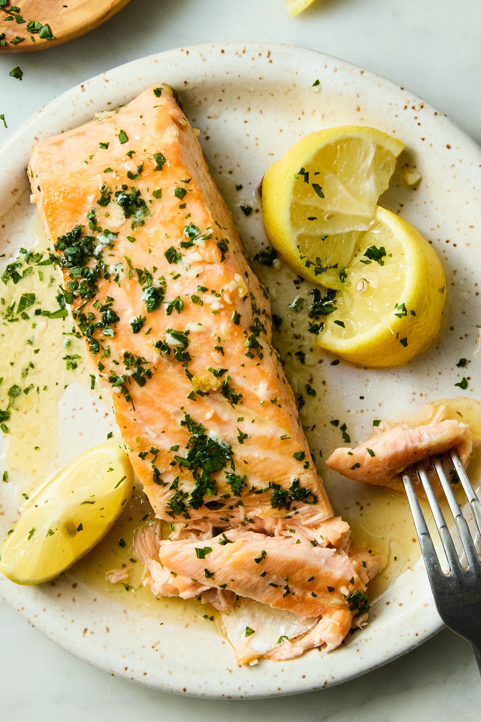 Lemon Brown Butter Salmon hearty salmon filets are generously seasoned with salt and pan seared in browned butter lemon zest and lemon juice, then topped with a flurry of freshly chopped herbs