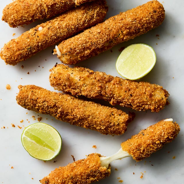 mozzarella sticks wrapped rice paper, then bread with parm and basil studded panko and fried until deep golden brown, ooey, gooey, and a little bit chewy