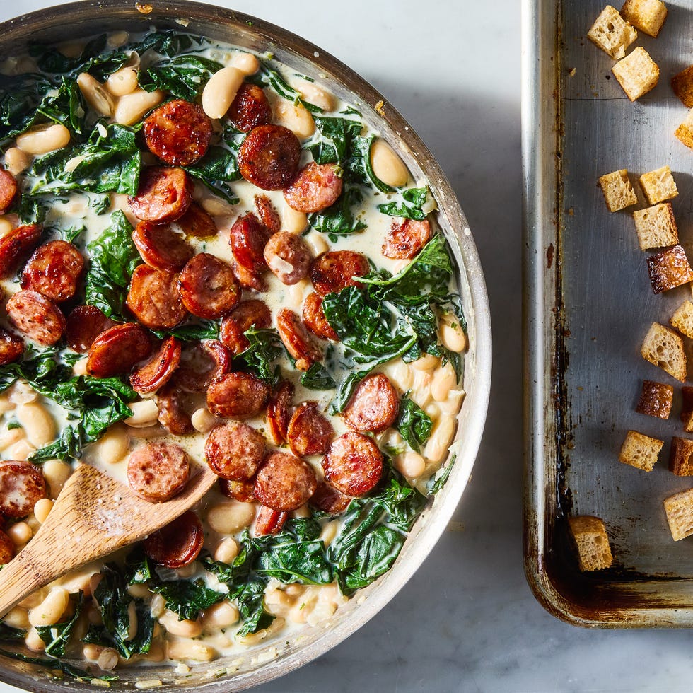 seared smoked sausage smothered in a creamy boursin sauce tossed with tender cannellini beans and kale hen topped with crunchy homemade mini croutons