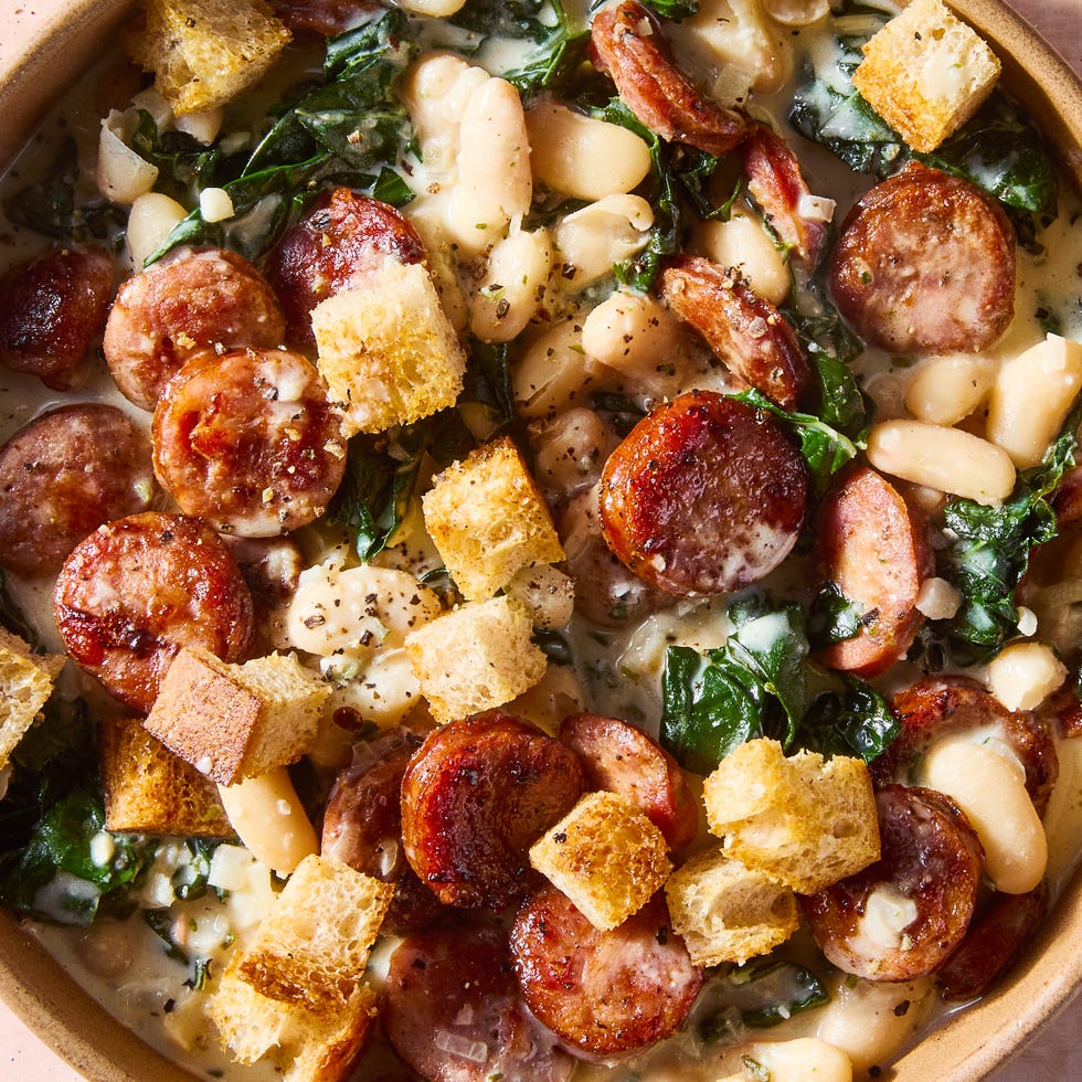 seared smoked sausage smothered in a creamy boursin sauce tossed with tender cannellini beans and kale hen topped with crunchy homemade mini croutons