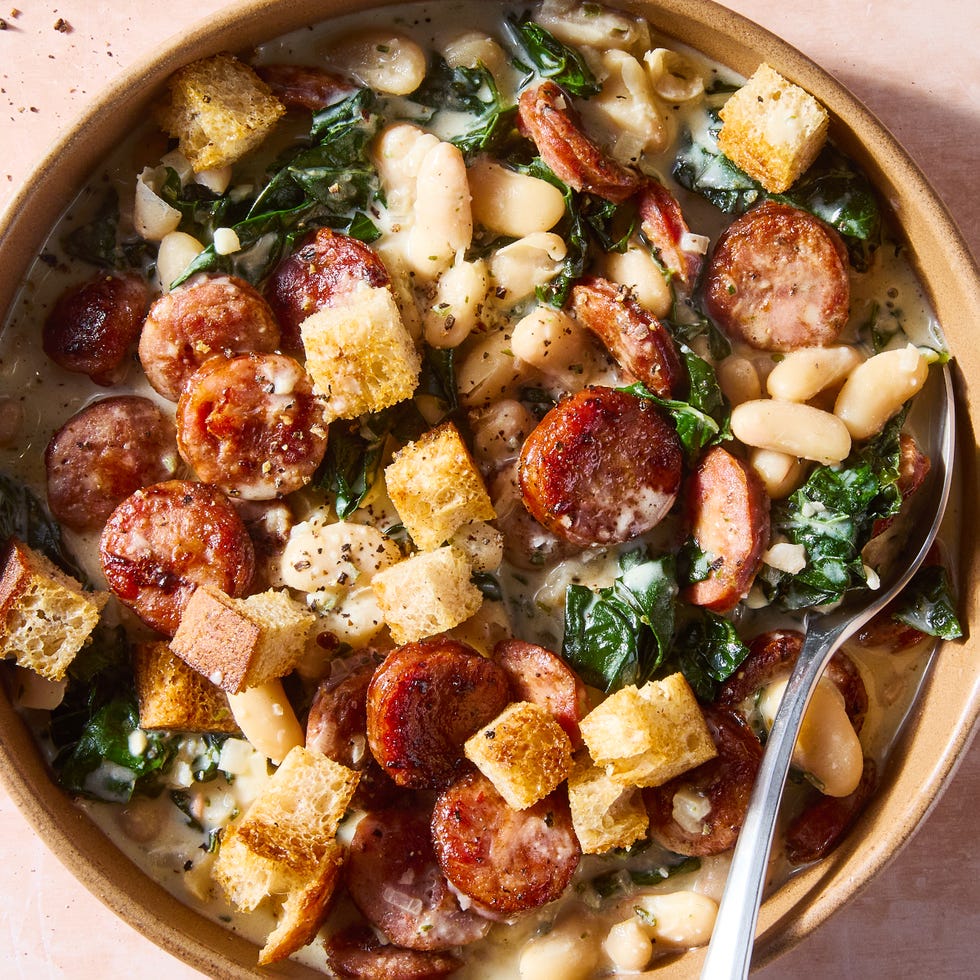 seared smoked sausage smothered in a creamy boursin sauce tossed with tender cannellini beans and kale hen topped with crunchy homemade mini croutons