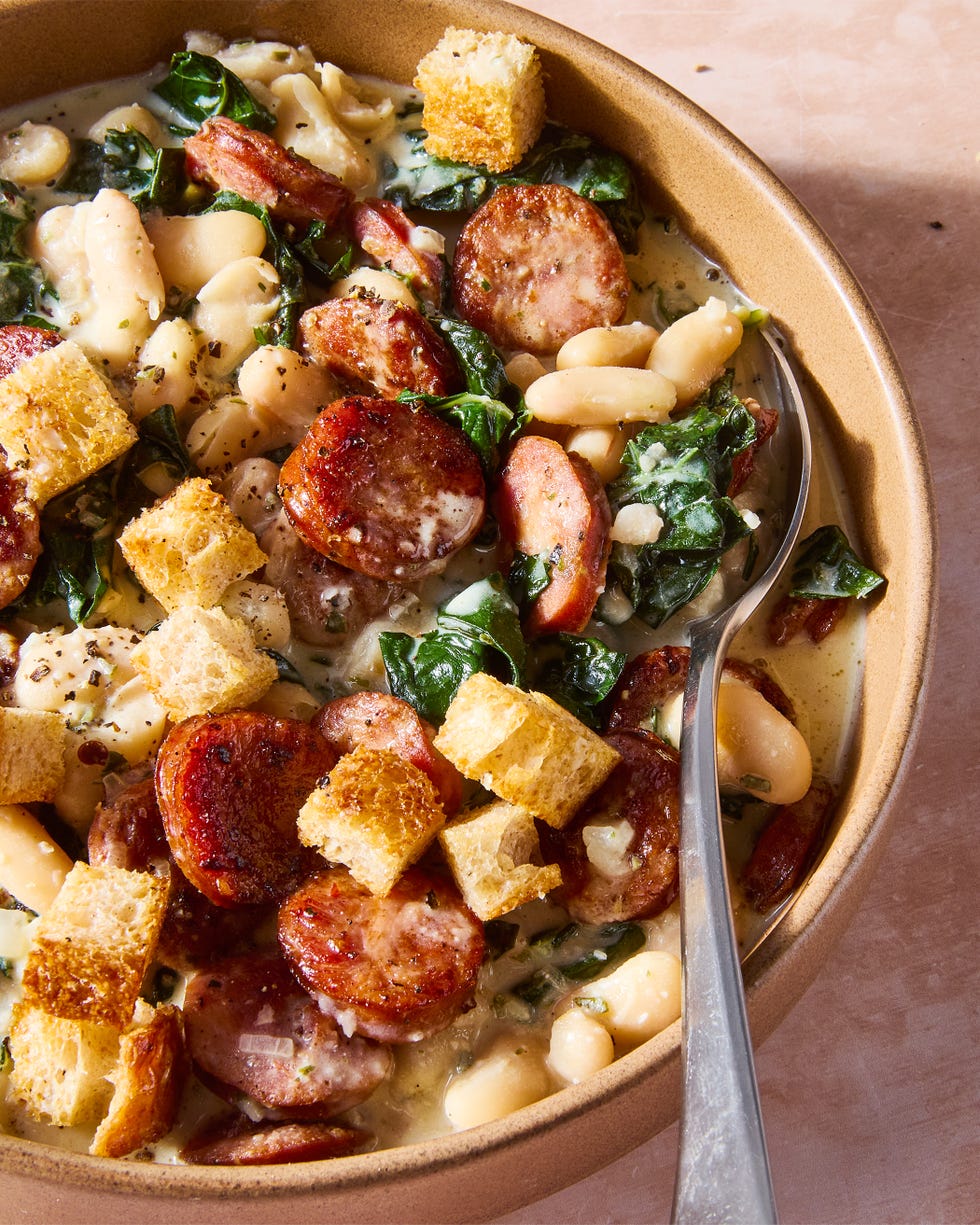 seared smoked sausage smothered in a creamy boursin sauce tossed with tender cannellini beans and kale hen topped with crunchy homemade mini croutons