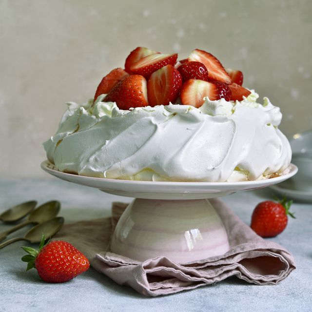 delicious summer cake "pavlova" with whipped cream and fresh strawberry