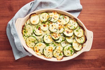 cheesy scalloped zucchini   delishcom