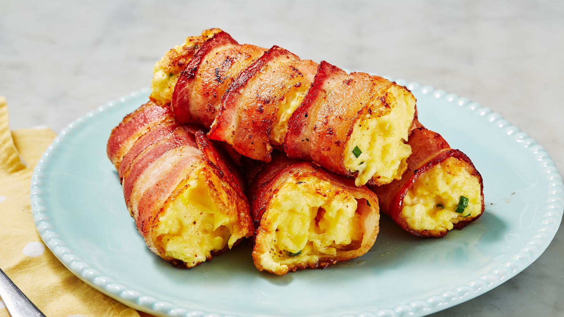 https://hips.hearstapps.com/hmg-prod/images/delish-190919-bacon-and-cheese-rollups-0078-landscape-pf-1571782990.jpg?crop=1xw:0.8441943127962085xh;center,top