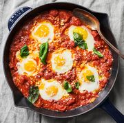 eggs in purgatory, eggs baked into tomato sauce in a skillet