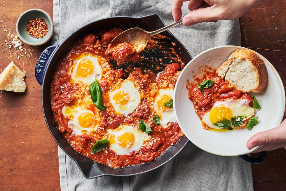 eggs in purgatory, eggs baked into tomato sauce in a skillet