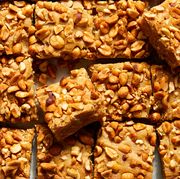 honey and peanut butter blondies topped with honey roasted peanuts