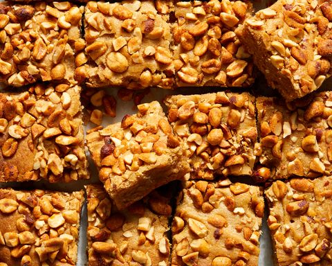 honey and peanut butter blondies topped with honey roasted peanuts