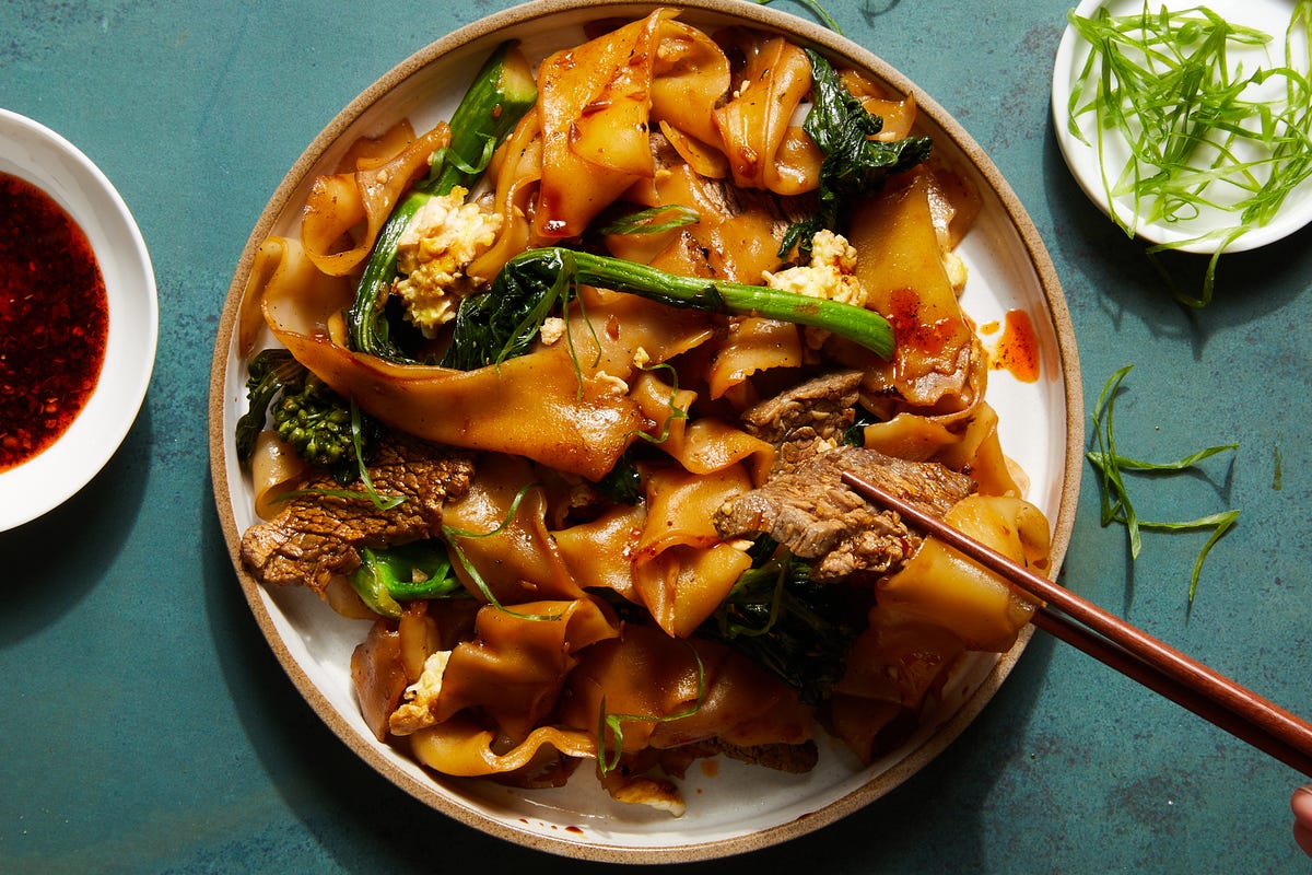 steak pad see ew with chinese broccoli and egg