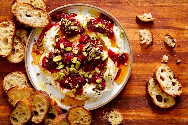 whipped garlic and herb feta, topped with fresh cranberry sauce, pistachios, and honey