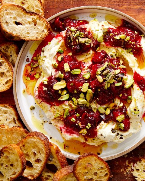 whipped garlic and herb feta, topped with fresh cranberry sauce, pistachios, and honey