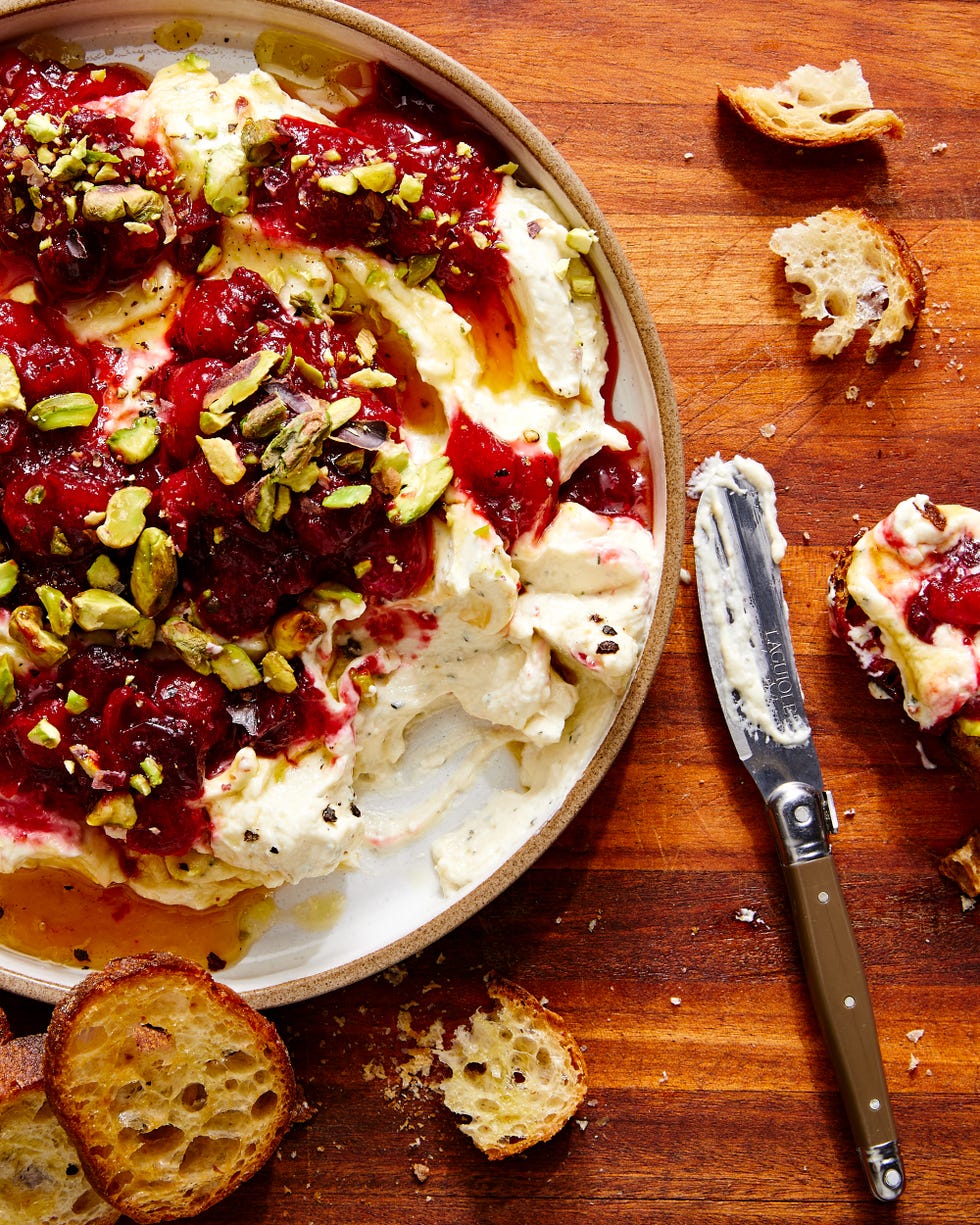 whipped garlic and herb feta, topped with fresh cranberry sauce, pistachios, and honey