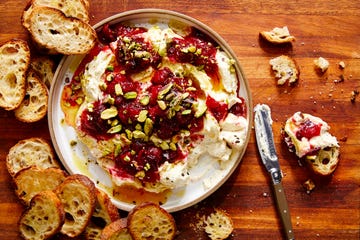 whipped garlic and herb feta, topped with fresh cranberry sauce, pistachios, and honey