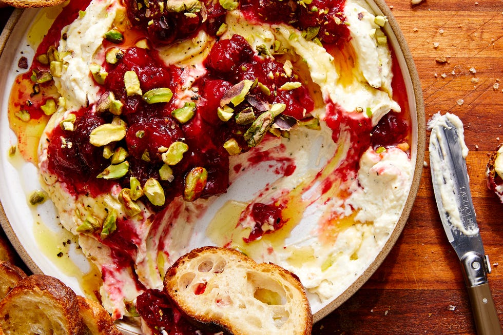 whipped garlic and herb feta, topped with fresh cranberry sauce, pistachios, and honey