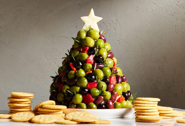 antipasto cheeseball christmas tree with pepperoncini, salami, and artichoke