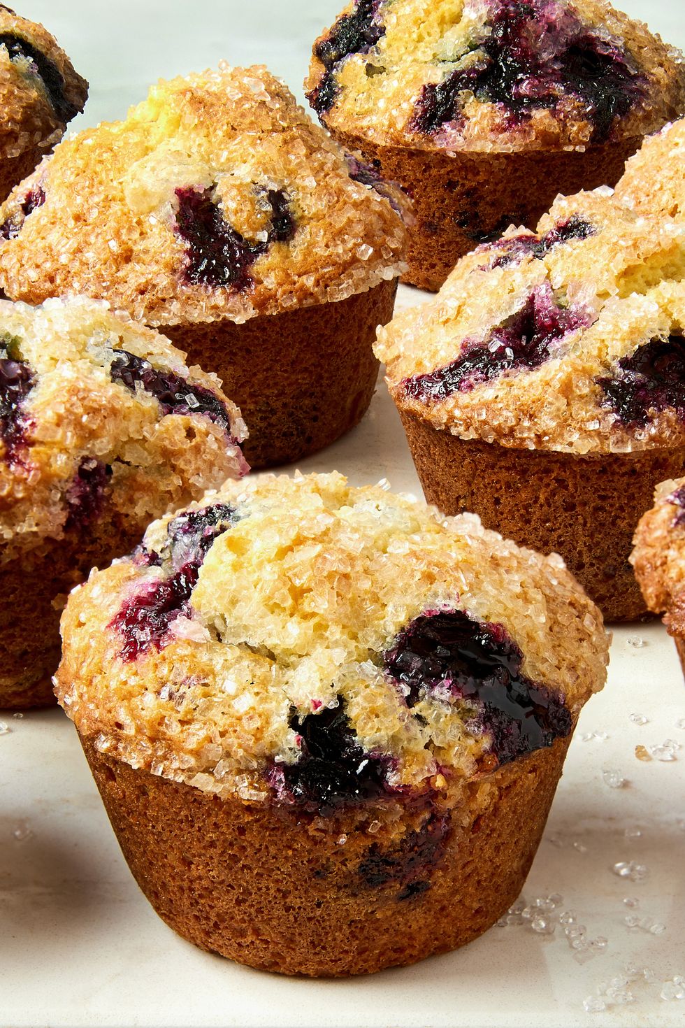 blueberry muffins topped with sugar