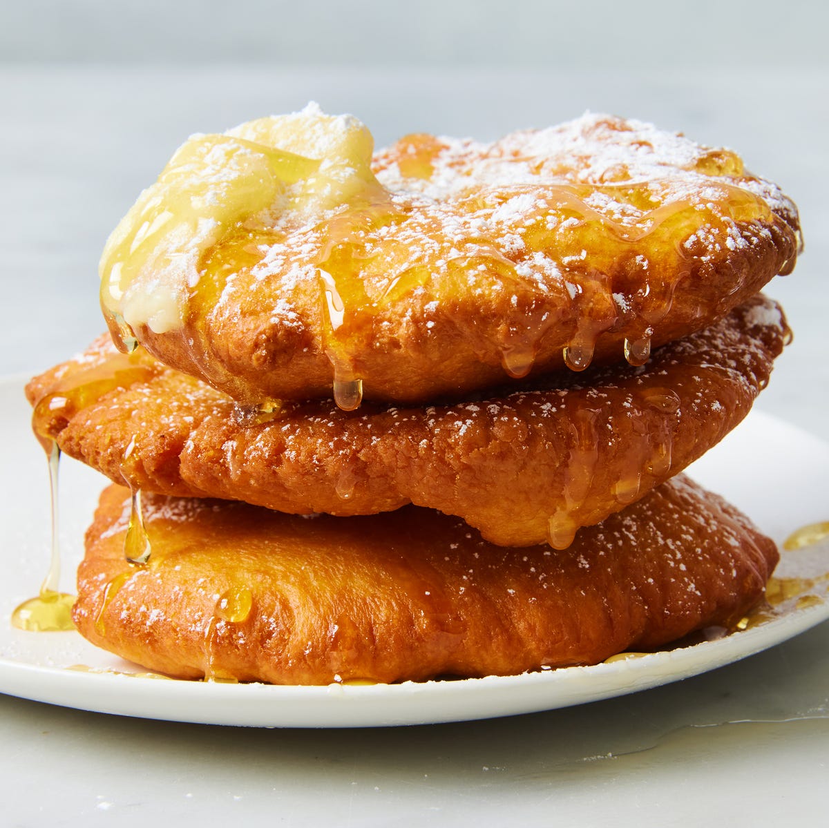 utah scones with honey butter and powdered sugar