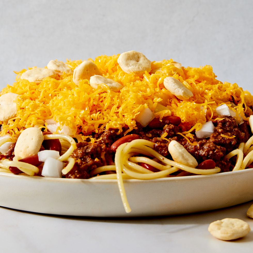 cincinnati chili with cheddar, kidney beans, onion, and oyster crackers