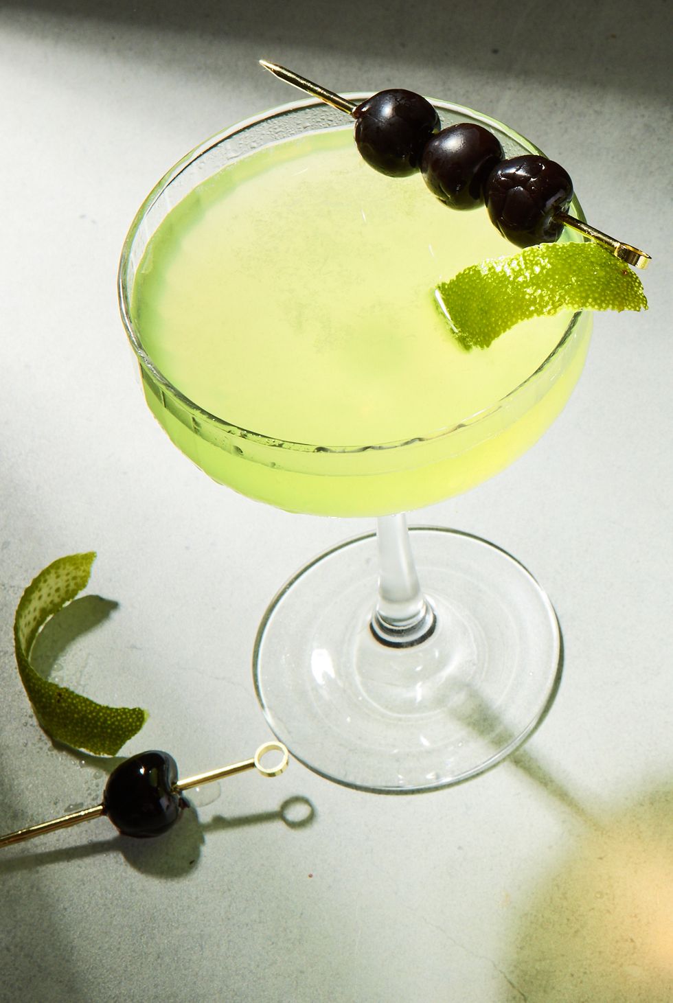 last word cocktail with lime juice, maraschino liqueur, and green chartreuse